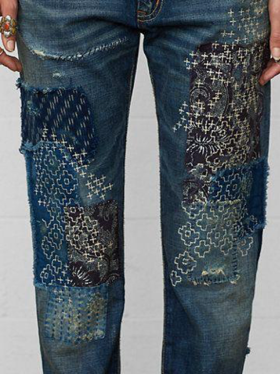 decorative mending embroidery on jeans