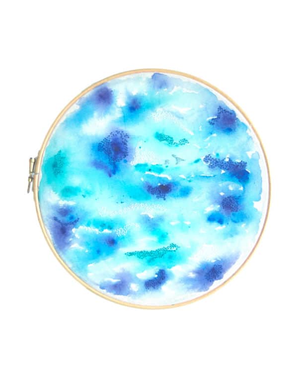 Sea from above painted and embroidered art hoop